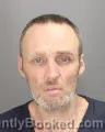 Booking photo from Oakland County, Michigan
