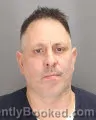 Booking photo from Oakland County, Michigan