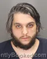 Mugshot of JOHNATHAN SAMIH ARAJ booked in Oakland County, Michigan on March 24, 2026
