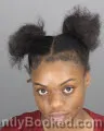 Mugshot of DONISHA VENICE JOHNSON booked in Oakland County, Michigan on March 30, 2026