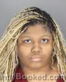 Mugshot of DEASIA MALINDA SHARNISE HUNTER booked in Oakland County, Michigan on April 1, 2026