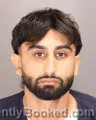 Mugshot of EMAD REHMAN booked in Oakland County, Michigan on April 26, 2026