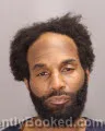 Mugshot of JERMAINE ADOLPHUS CUNNINGHAM booked in Oakland County, Michigan on April 27, 2026