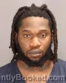 Mugshot of KOLAWOLE SAMSON OGUNDOWO booked in Oakland County, Michigan on April 28, 2026