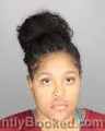 Mugshot of ARIEL MICHELLE ASKEW-REED booked in Oakland County, Michigan on April 28, 2026