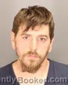 Mugshot of JOSHUA EDWARD GRIM booked in Oakland County, Michigan on April 29, 2026