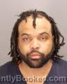 Mugshot of RENNE ISAAC DOUGLAS booked in Oakland County, Michigan on April 30, 2026