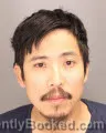 Mugshot of HOANG XUAN TRAN booked in Oakland County, Michigan on May 6, 2026