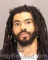 Mugshot of OMARI JAMARRLEE JOHNSON booked in Oakland County, Michigan on May 18, 2026