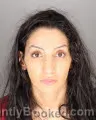Mugshot of ZEINAB MAJED HOURANI booked in Oakland County, Michigan on May 19, 2026
