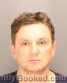 Mugshot of ANDI TOPCIU booked in Oakland County, Michigan on May 19, 2026