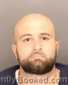 Mugshot of SHADY BINEMADSAMI KARIM booked in Oakland County, Michigan on May 21, 2026