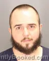 Mugshot of AUSTIN RAMIG HELZER booked in Oakland County, Michigan on May 22, 2026