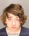 Mugshot of CHRISTIAN THOMAS HARVEY booked in Oakland County, Michigan on May 22, 2026