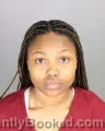 Mugshot of NIA LYNN COX booked in Oakland County, Michigan on May 25, 2026