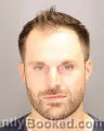 Booking photo from Oakland County, Michigan