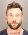 Mugshot of JONATHON VINCENT GEISS booked in Oakland County, Michigan on June 24, 2026