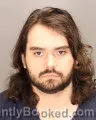 Mugshot of JUSTIN TROY DELEON booked in Oakland County, Michigan on June 26, 2026