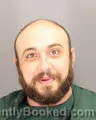 Mugshot of TAHA MOHAMMAD ABDULJABAR booked in Oakland County, Michigan on June 26, 2026