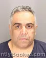 Mugshot of HASAN ALI BRISAM booked in Oakland County, Michigan on June 26, 2026