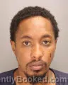 Mugshot of DARION DEVONTE SUTTLES booked in Oakland County, Michigan on June 29, 2026