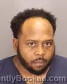 Mugshot of QUINSHUN DEMONDMCKINLEY LEE booked in Oakland County, Michigan on June 30, 2026