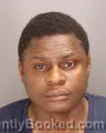 Mugshot of CHARLES ONSINYO MONARI booked in Oakland County, Michigan on July 1, 2026