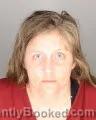 Mugshot of TARA MARIE DENOMIE booked in Oakland County, Michigan on July 1, 2026