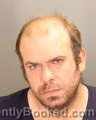 Mugshot of JOSEPH DANIEL REINHART booked in Oakland County, Michigan on July 2, 2026