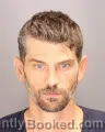 Mugshot of TYLER PHILLIP LANG booked in Oakland County, Michigan on July 3, 2026