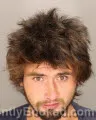 Mugshot of VLAD NOVIKOV RAY booked in Oakland County, Michigan on July 6, 2026