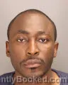 Mugshot of CROSS HERITIER-JEAN KINGUMBA booked in Oakland County, Michigan on July 7, 2026