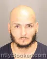 Mugshot of CHRISTIAN OMAR QUINONES-DELGADO booked in Oakland County, Michigan on July 12, 2026