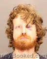 Mugshot of MITCHELL RYAN WILCOX booked in Oakland County, Michigan on July 12, 2026