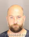 Mugshot of ROBERT ADHAM booked in Oakland County, Michigan on July 12, 2026
