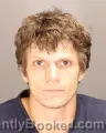 Mugshot of TYLER EDWARD RAYMOND BIDIMAN booked in Oakland County, Michigan on July 14, 2026