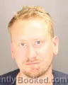 Mugshot of CHRISTIAN SIDNEY GRATES booked in Oakland County, Michigan on July 15, 2026