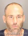 Mugshot of LEVIN JAEL TAULBEE booked in Oakland County, Michigan on July 16, 2026