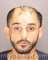 Mugshot of Ben Binzakhar Izrailov booked in Oakland County, Michigan on August 16, 2026