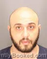 Mugshot of Taha Mohammad Abduljabar booked in Oakland County, Michigan on August 18, 2026