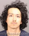 Mugshot of Carlos Elias Guzman booked in Oakland County, Michigan on August 18, 2026