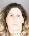 Mugshot of Karen Kamil Hamama booked in Oakland County, Michigan on August 18, 2026