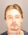Booking photo from Oakland County, Michigan