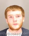 Mugshot of Eric Bradley Bauman booked in Oakland County, Michigan on August 19, 2026