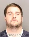 Mugshot of Benjamin James Lakins booked in Oakland County, Michigan on August 21, 2026