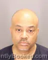 Mugshot of Charles Lesley-Anton Burnett booked in Oakland County, Michigan on August 22, 2026