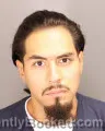 Mugshot of Hilario Chris Alvarado booked in Oakland County, Michigan on August 25, 2026