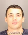 Mugshot of Nikolas Gjurashaj booked in Oakland County, Michigan on August 25, 2026