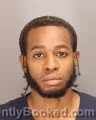 Mugshot of Timon Besharie Reed booked in Oakland County, Michigan on August 26, 2026