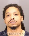 Mugshot of Rmoni Tyrell Jones booked in Oakland County, Michigan on August 26, 2026